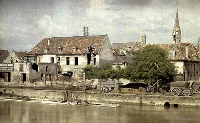 Carts along the bank of the Aisne, church of Saint-Waast in the background, Soissons, 1917 by Fernand Cuville